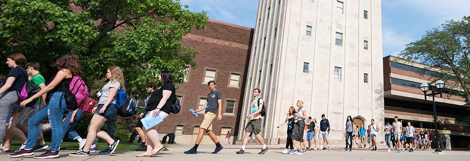 New students walking campus during orientation tour